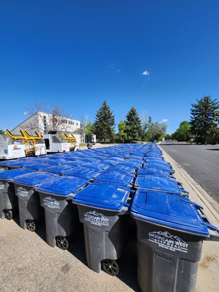 A whole street of freshly cleaned bins behind the RMBB truck